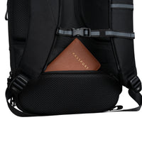 Black backpack with a brown leather pocket labeled 'Passport' on a white background