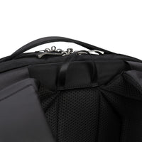 Close-up of a black backpack zip closure on a white background