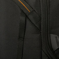 Close-up of a black backpack with orange stitching detail