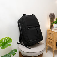 Targus black laptop backpack lifestyle image on seat