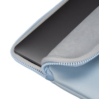 Light blue zippered pouch with a black electronic device inside on a white background