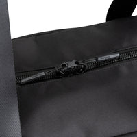 Close-up of a black nylon bag with a black zipper and a silver-toned metal pull tab labeled 'Furmin'.