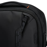 Close-up of a black backpack with visible brand logo on a white background