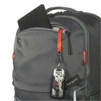 Gray backpack with a keychain and Targus logo on a black background