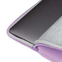Close-up of a purple laptop sleeve with a white background