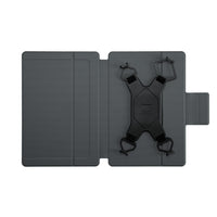 Black device with straps on a gray stand against a white background