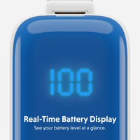 Close-up of a blue portable battery power bank with a digital LED display showing 100 and the text 'Real-Time Battery Display' and 'See your battery level at a glance.' on a light gray background.